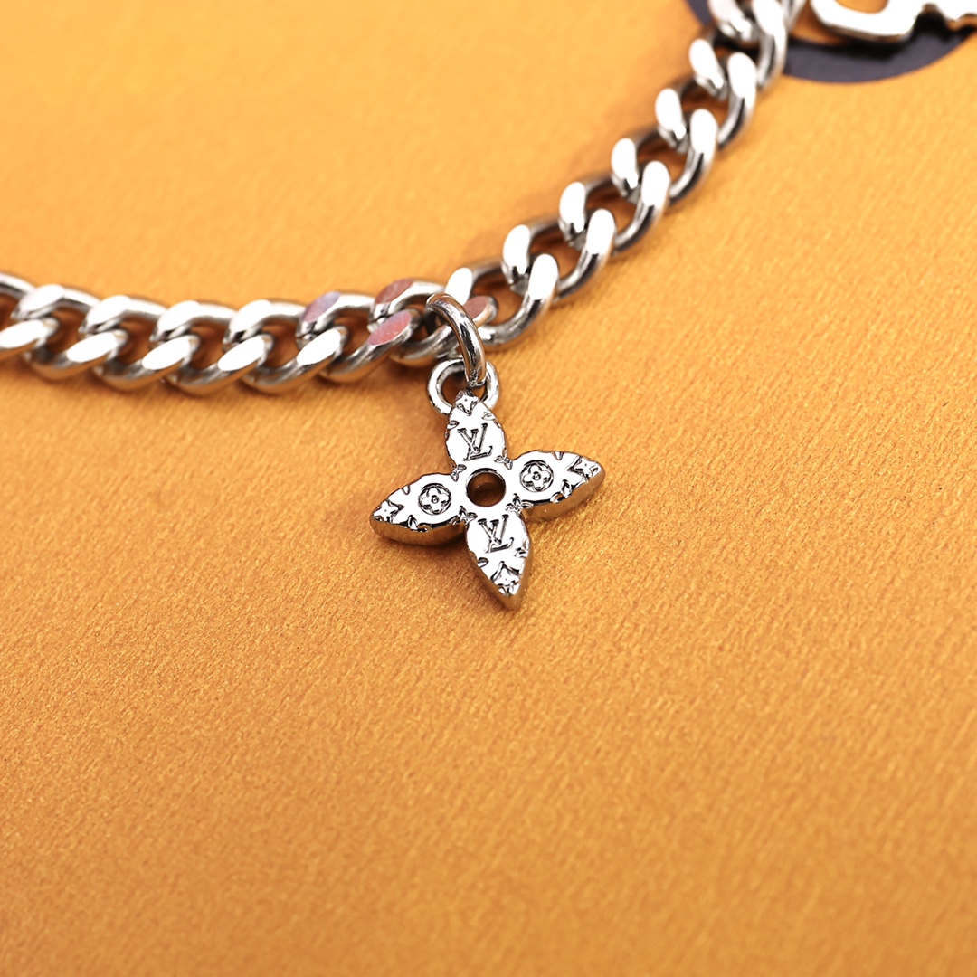 Louis Vuitton Monogram Lock Bracelet - DopestKickz