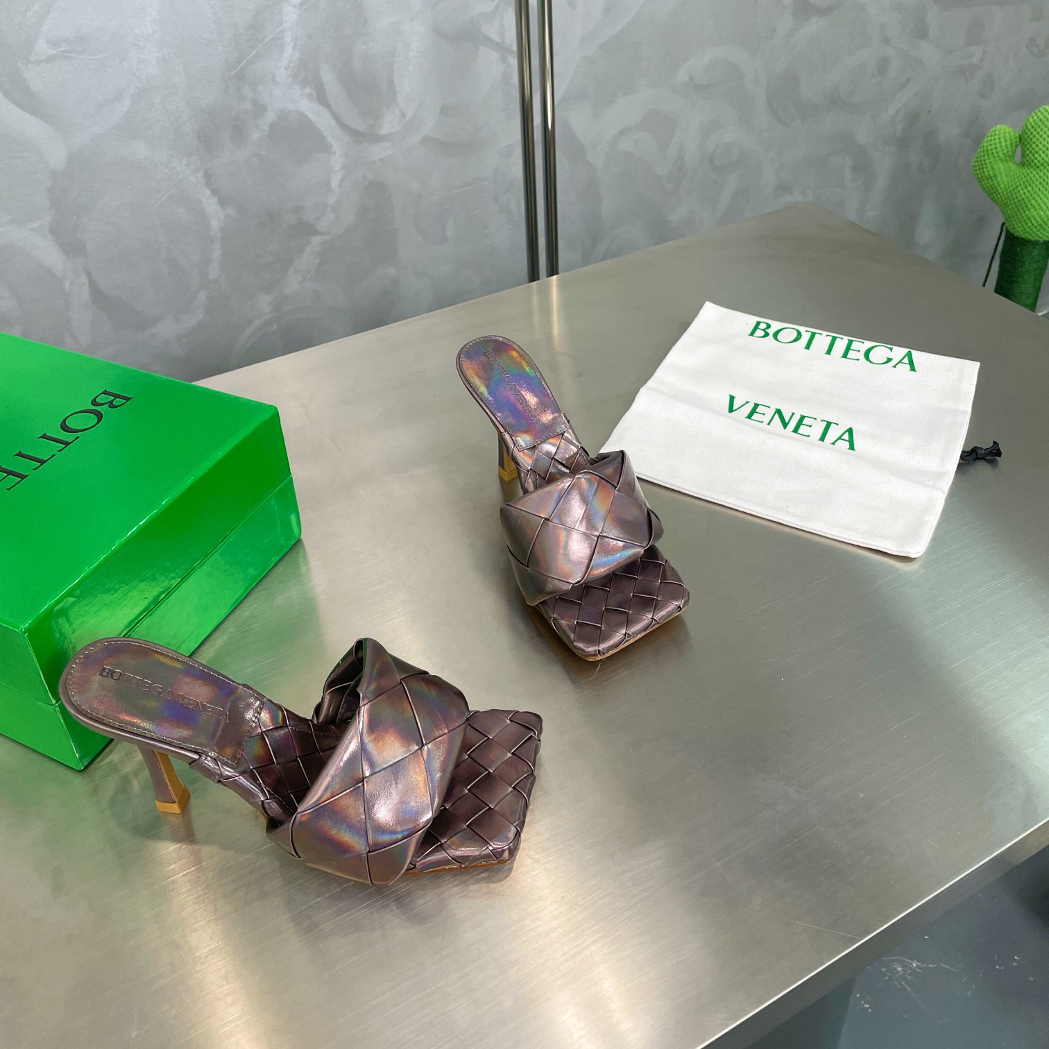 Bottega Veneta  Intreccio Metallized Leather Mules - DopestKickz