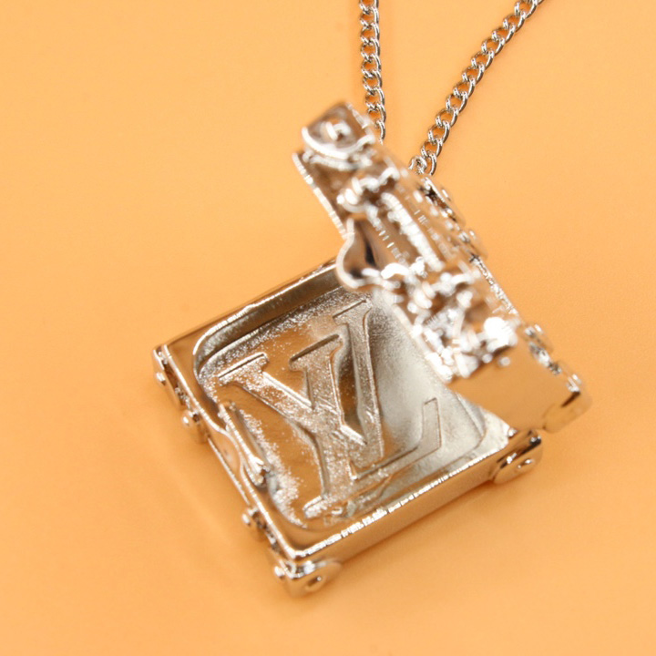 Louis Vuitton Trunk Locket Pendant      M00527 - DopestKickz
