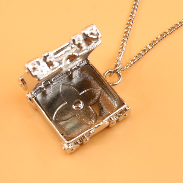 Louis Vuitton Trunk Locket Pendant      M00527 - DopestKickz