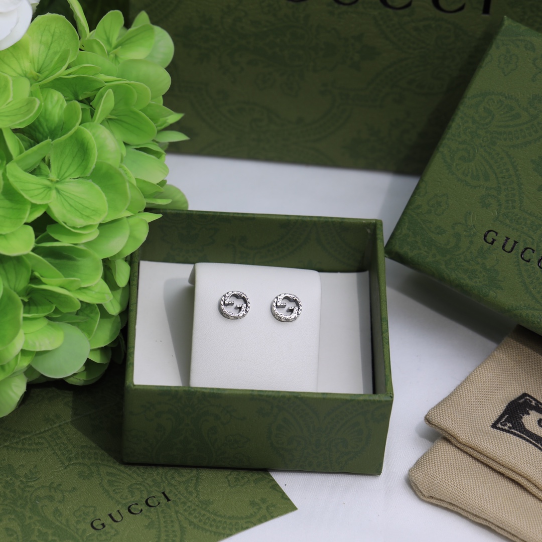 Gucci Interlocking G earrings In Silver - DopestKickz