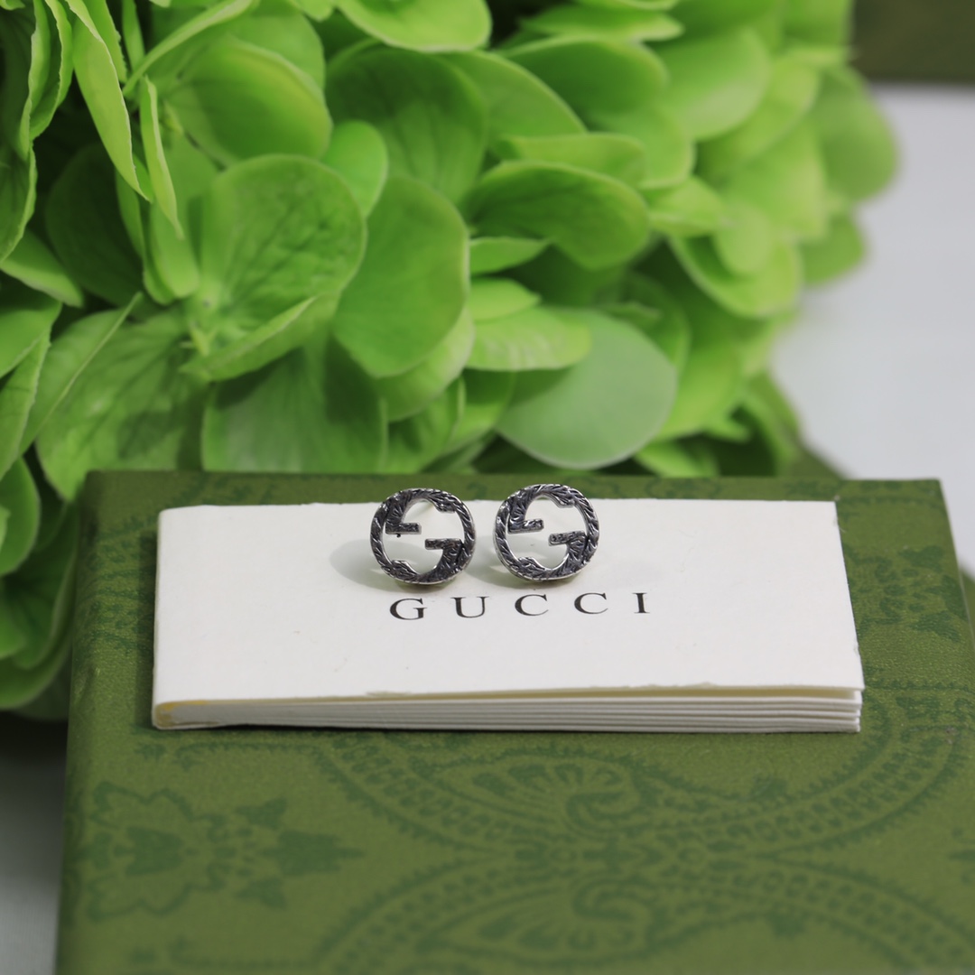 Gucci Interlocking G earrings In Silver - DopestKickz