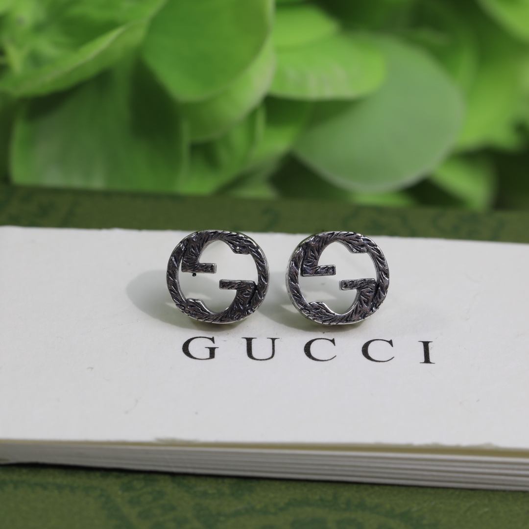Gucci Interlocking G earrings In Silver - DopestKickz