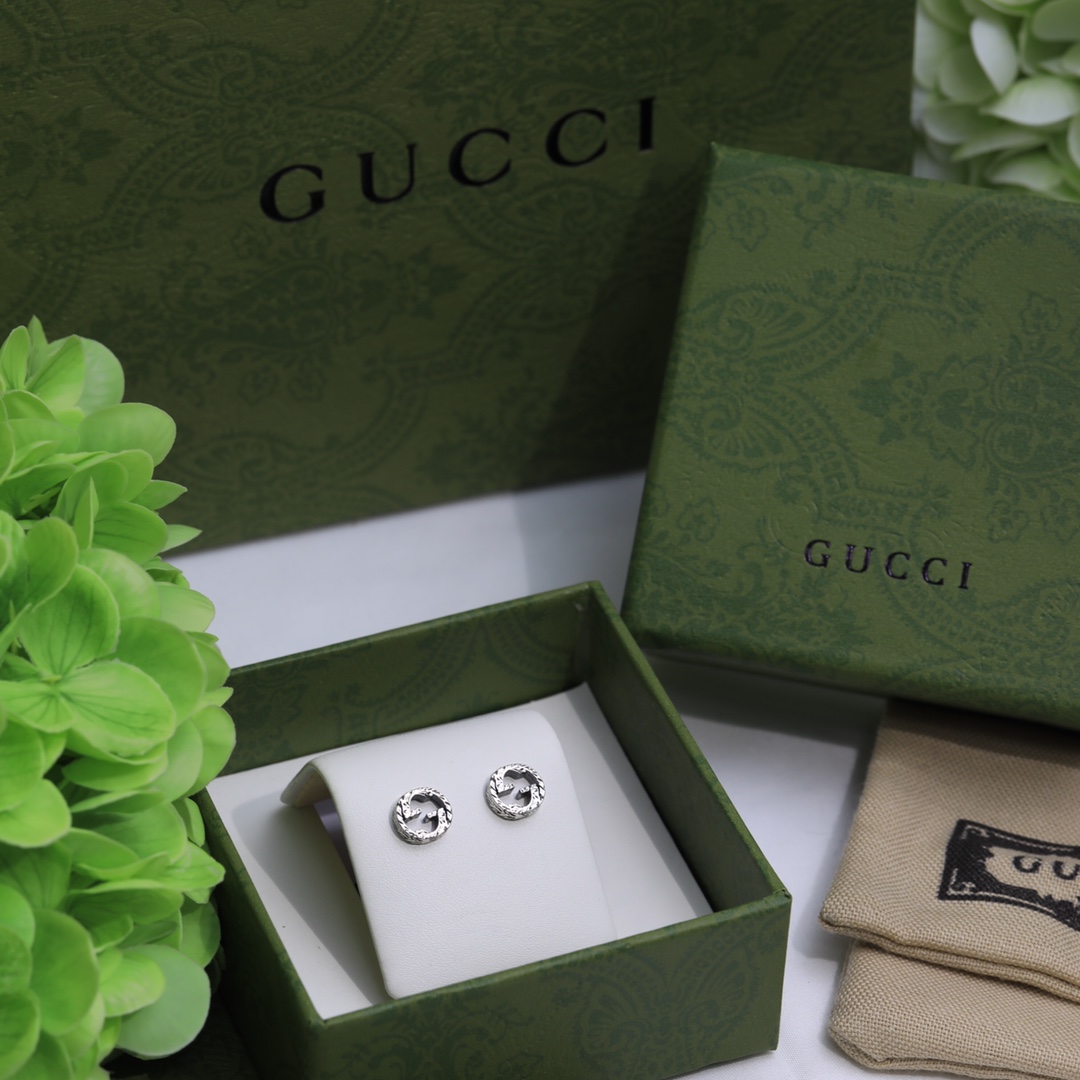 Gucci Interlocking G earrings In Silver - DopestKickz