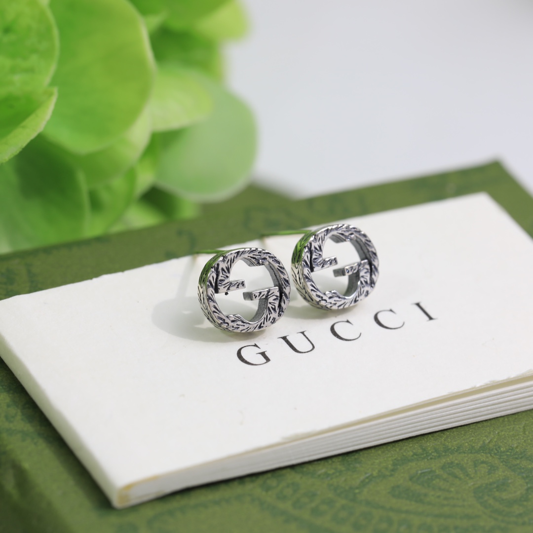 Gucci Interlocking G earrings In Silver - DopestKickz