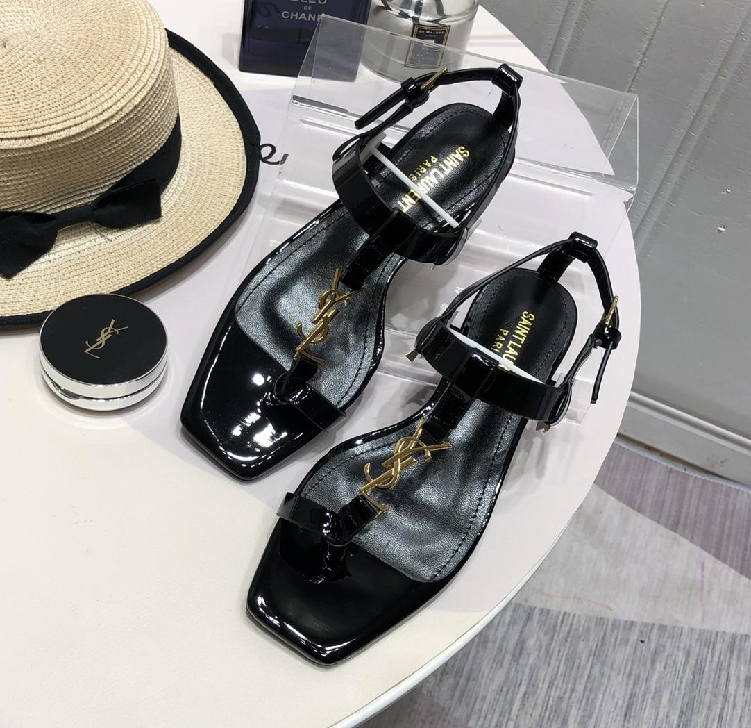 Saint Laurent Cassandra Flat Sandals In Patent Leather With Gold-Tone Monogram - DopestKickz