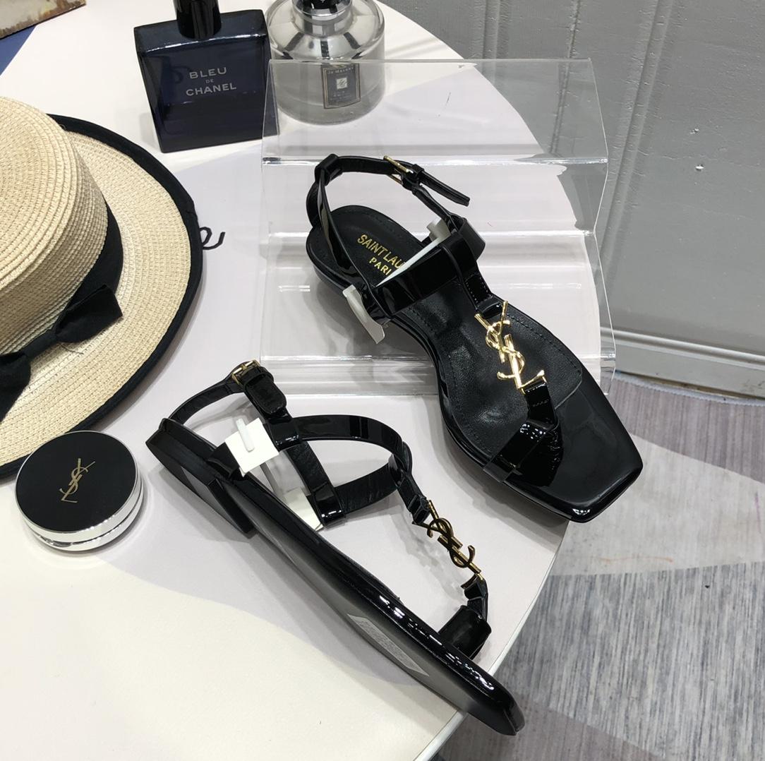 Saint Laurent Cassandra Flat Sandals In Patent Leather With Gold-Tone Monogram - DopestKickz