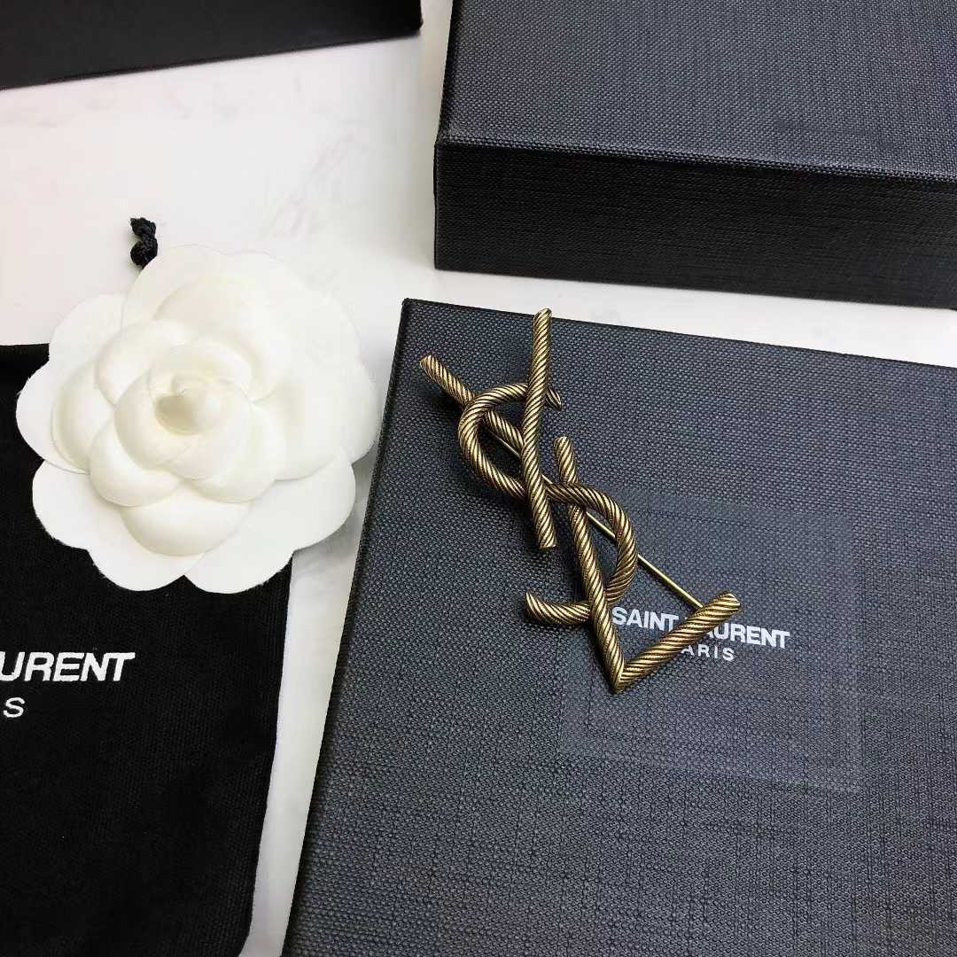 Saint Laurent Goldtone YSL Logo Brooch - DopestKickz