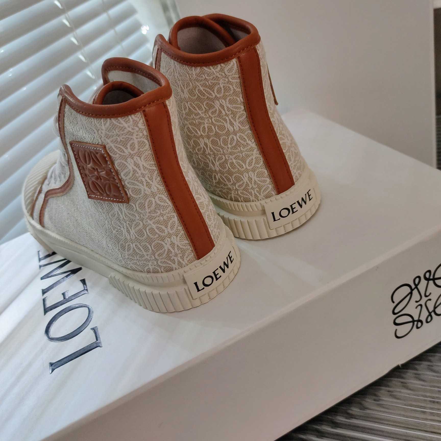 Loewe Anagram High Top Sneaker In Canvas - DopestKickz