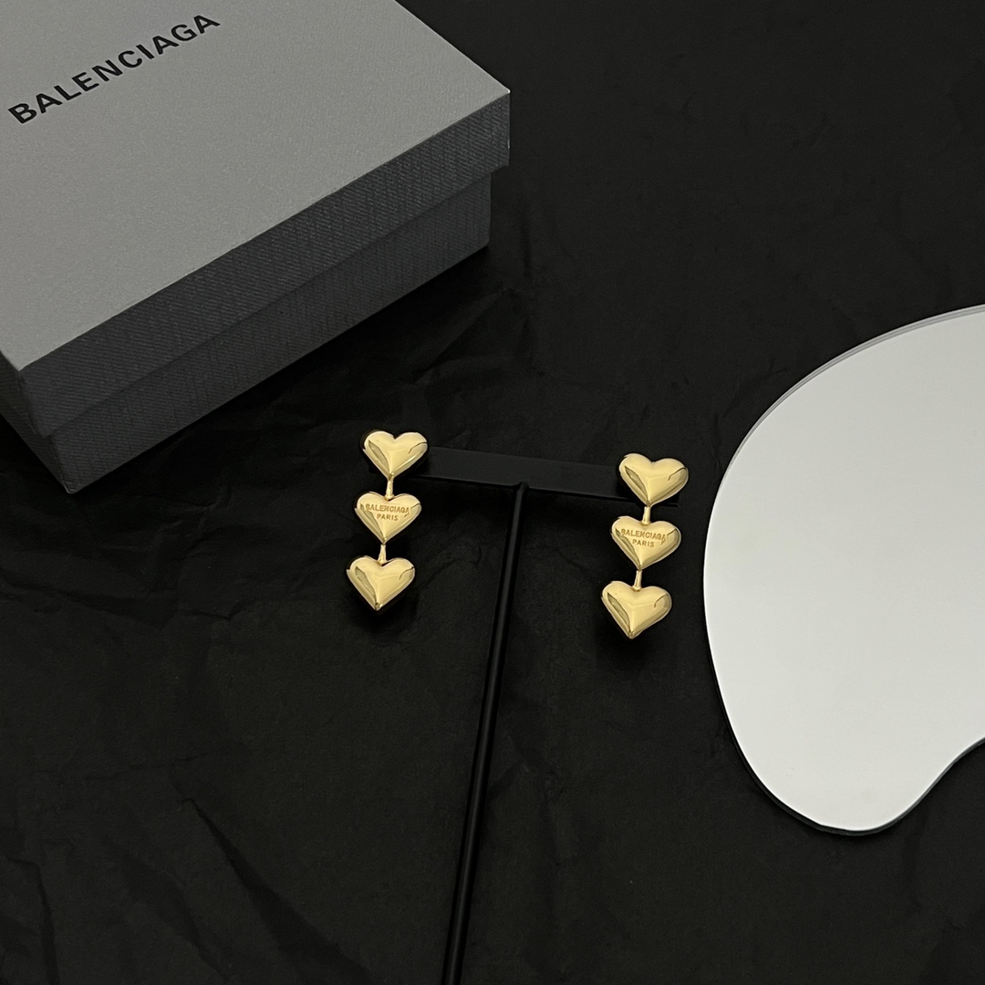 Balenciaga Women's Heart Earrings In Gold - DopestKickz