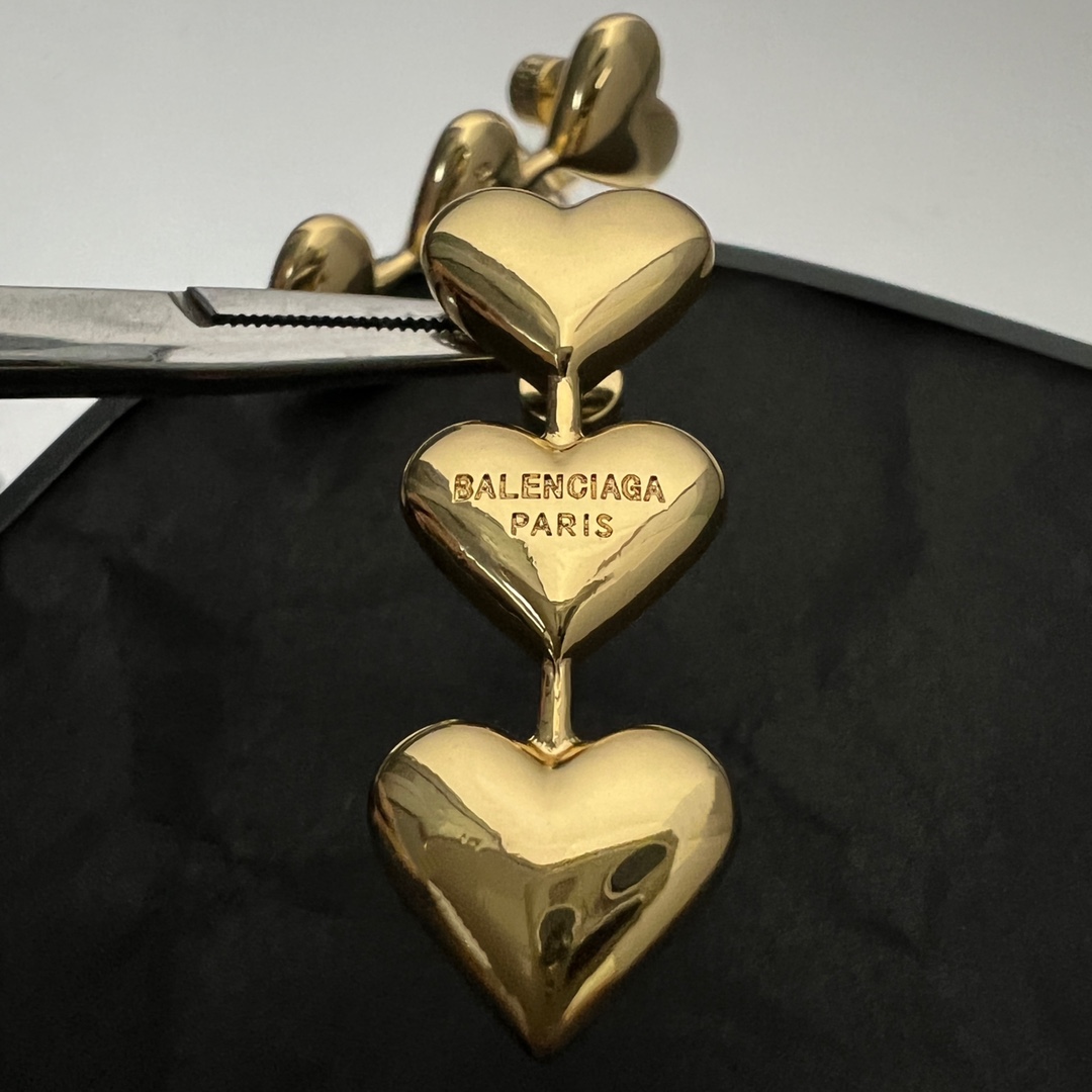 Balenciaga Women's Heart Earrings In Gold - DopestKickz