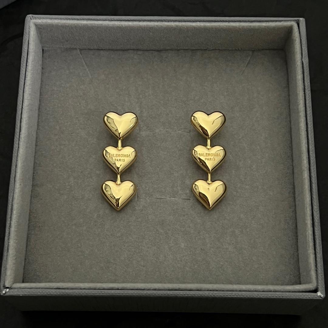 Balenciaga Women's Heart Earrings In Gold - DopestKickz