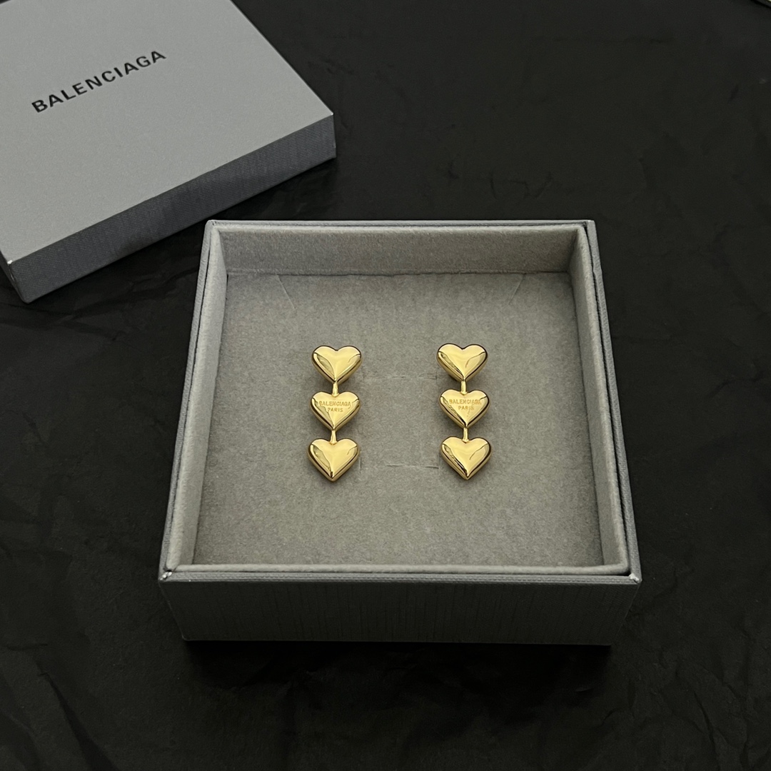 Balenciaga Women's Heart Earrings In Gold - DopestKickz