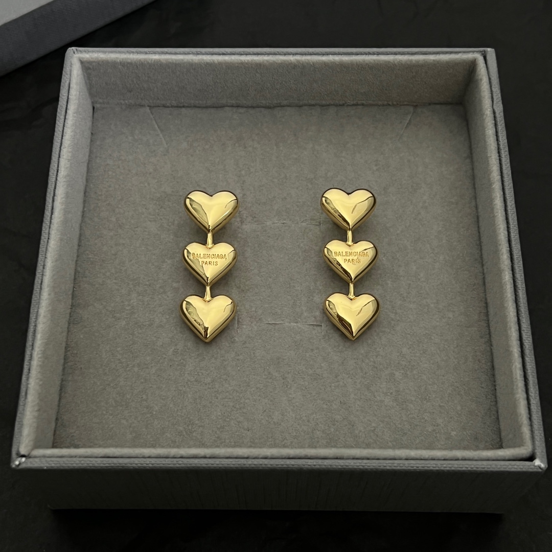 Balenciaga Women's Heart Earrings In Gold - DopestKickz
