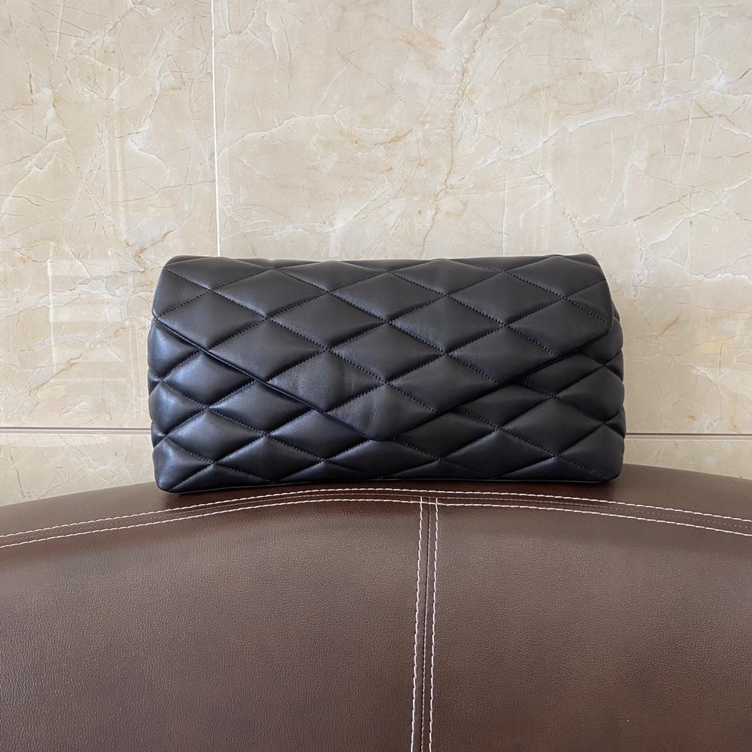 Saint Laurent Sade Puffer Quilted Leather Clutch In Black  - DopestKickz