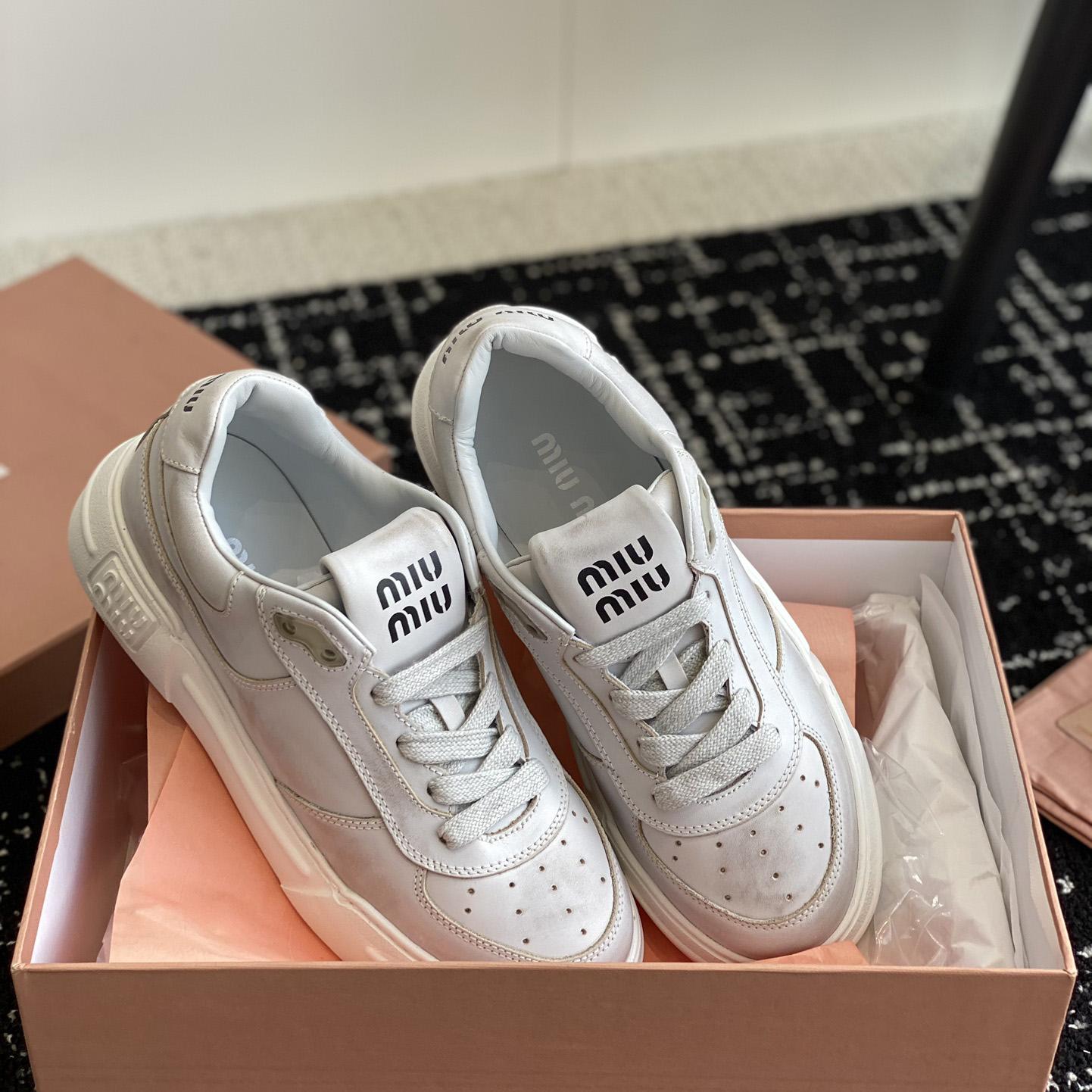 Miu Miu Bleached Leather Sneakers - DopestKickz