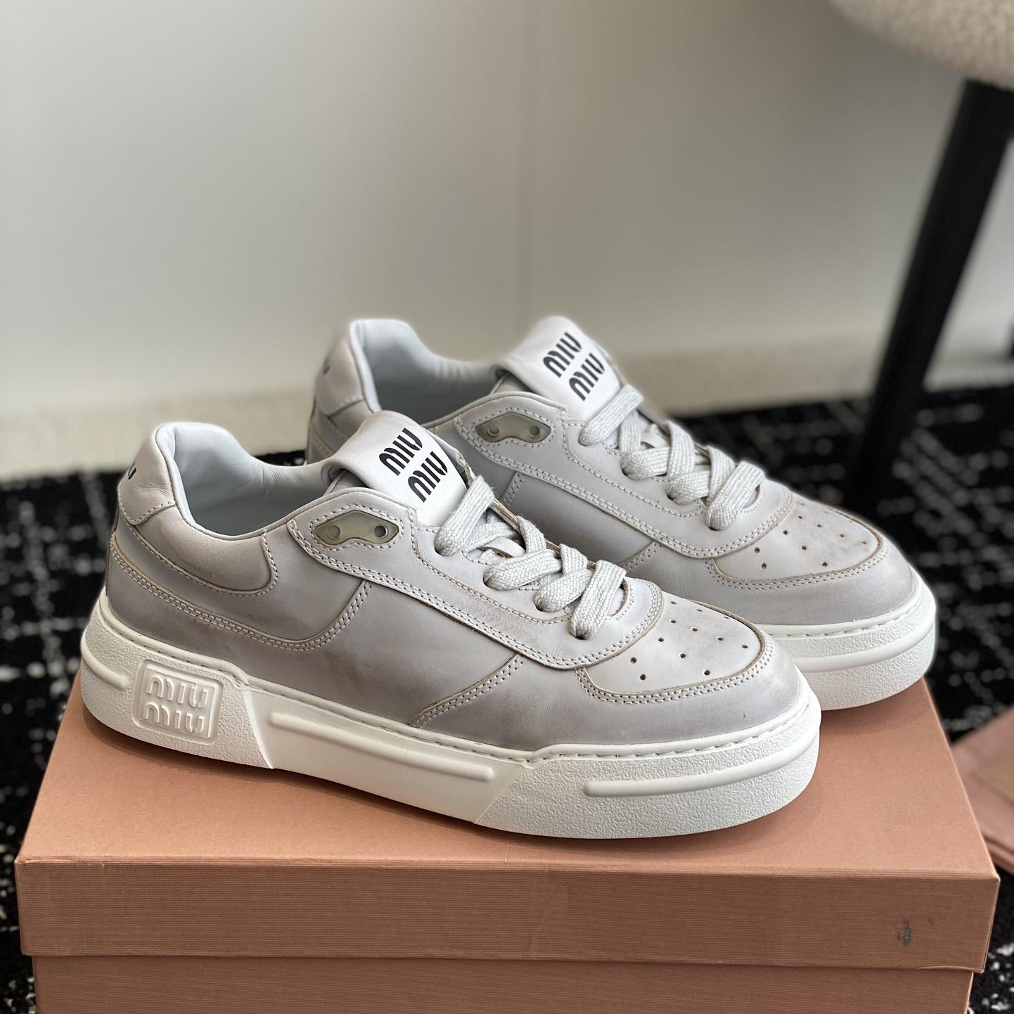 Miu Miu Bleached Leather Sneakers - DopestKickz