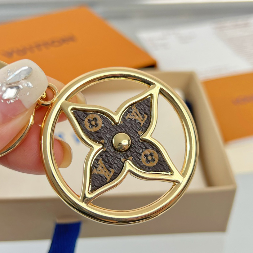 Louis Vuitton Puzzle Flower Monogram Keyring    M01207 - DopestKickz