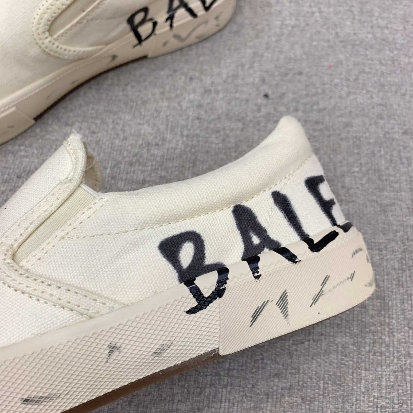 Balenciaga Paris Slip On Graffiti Sneaker In White  - DopestKickz