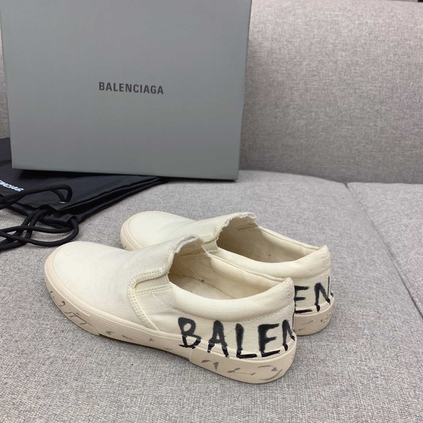 Balenciaga Paris Slip On Graffiti Sneaker In White  - DopestKickz