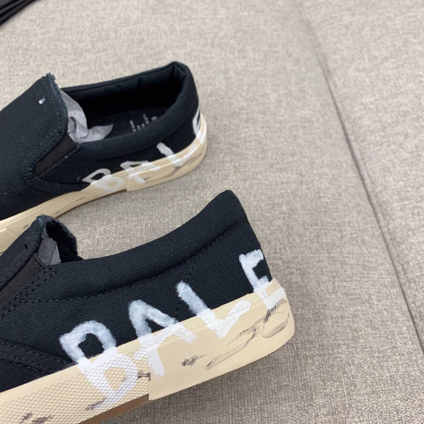 Balenciaga Paris Slip On Graffiti Sneaker In Black - DopestKickz