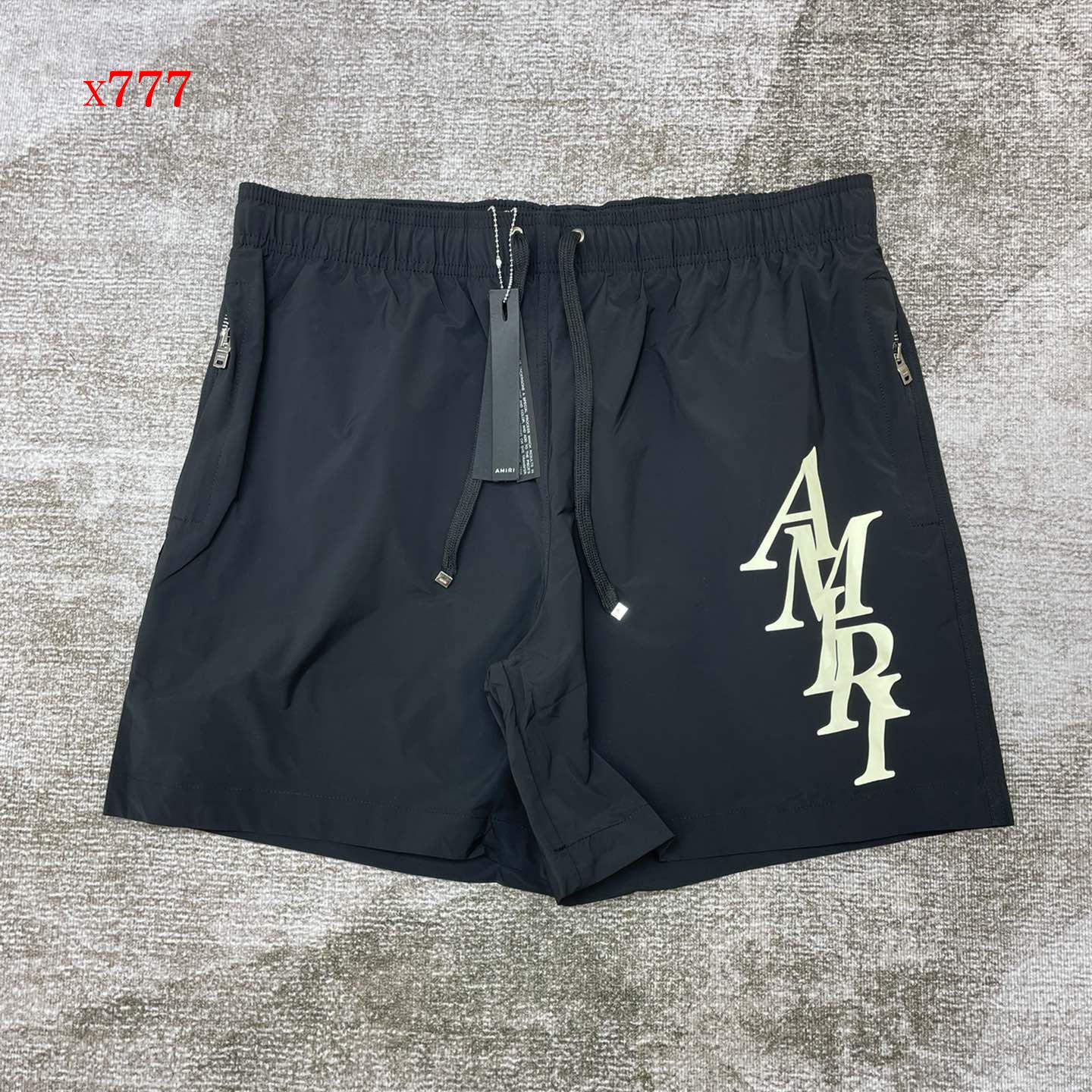 Amiri Stack Logo Swim Shorts       x777 - DopestKickz