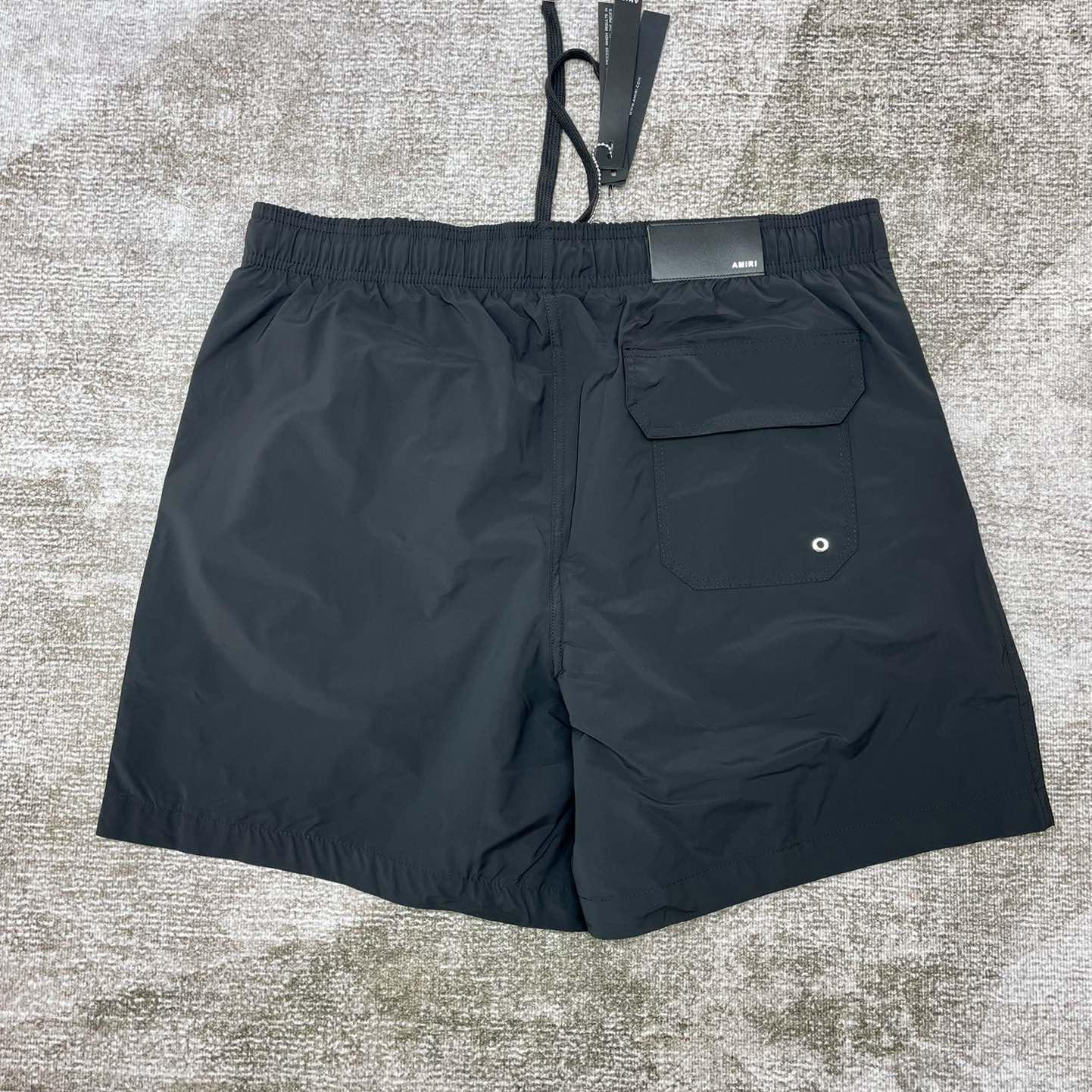 Amiri Stack Logo Swim Shorts       x777 - DopestKickz