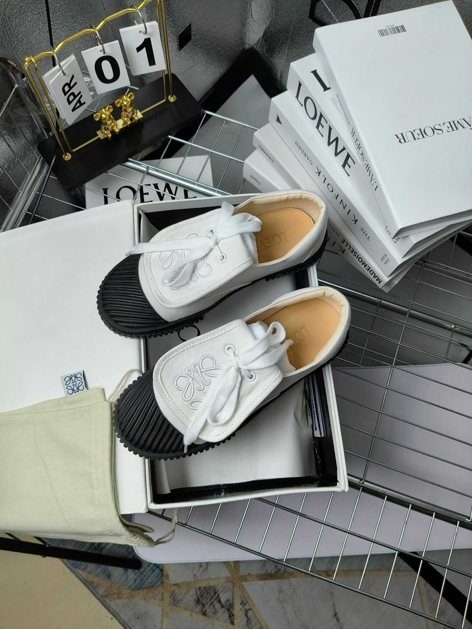 Loewe Anagram Embroidered Flap Low-Top Sneakers - DopestKickz