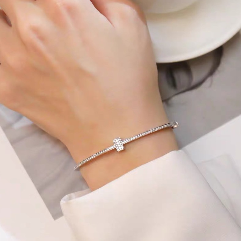 Tiffany & Co. 18K White Gold T Hinged Wire Bangle Bracelet - DopestKickz