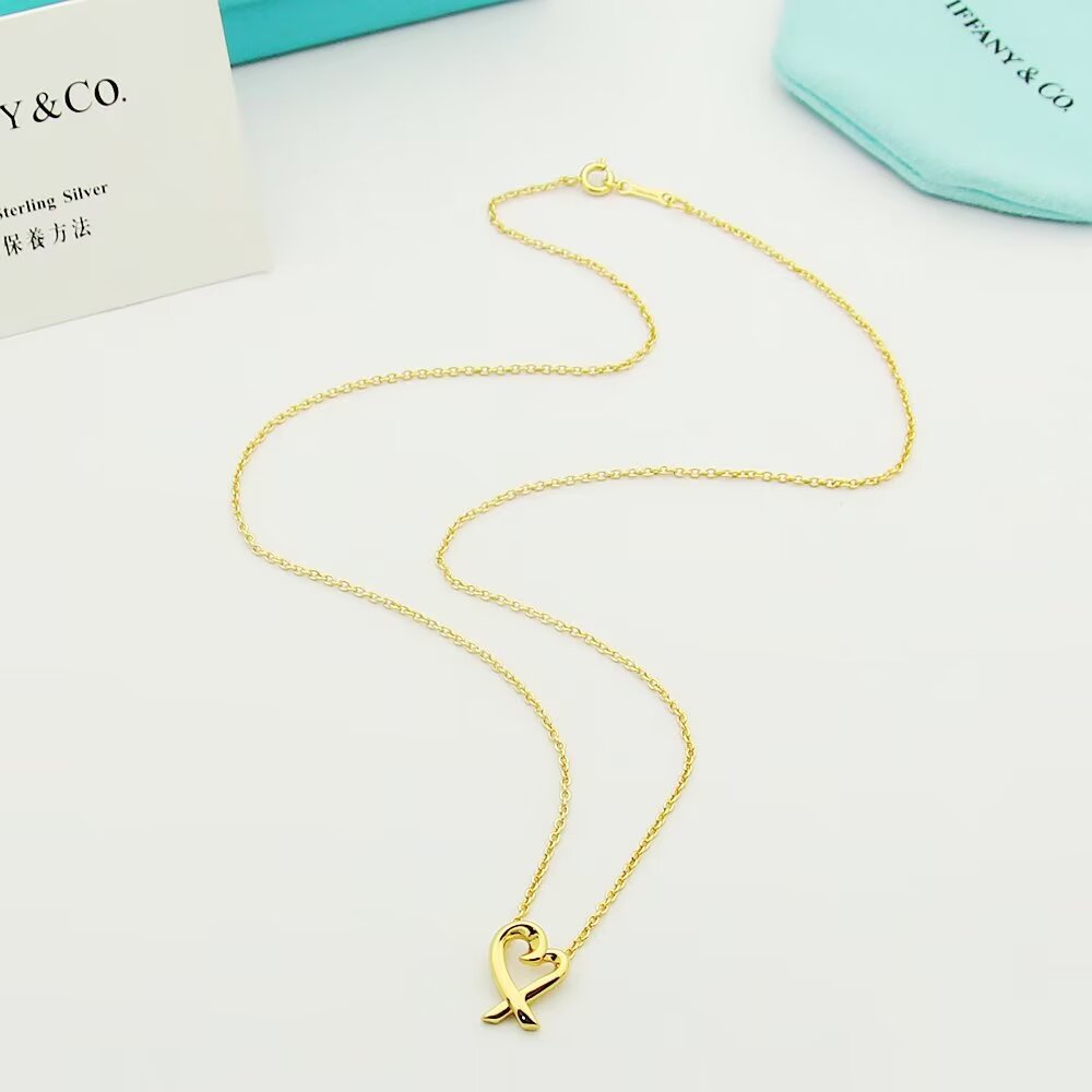 Tiffany & Co. Paloma Picasso Loving Heart Pendant - DopestKickz