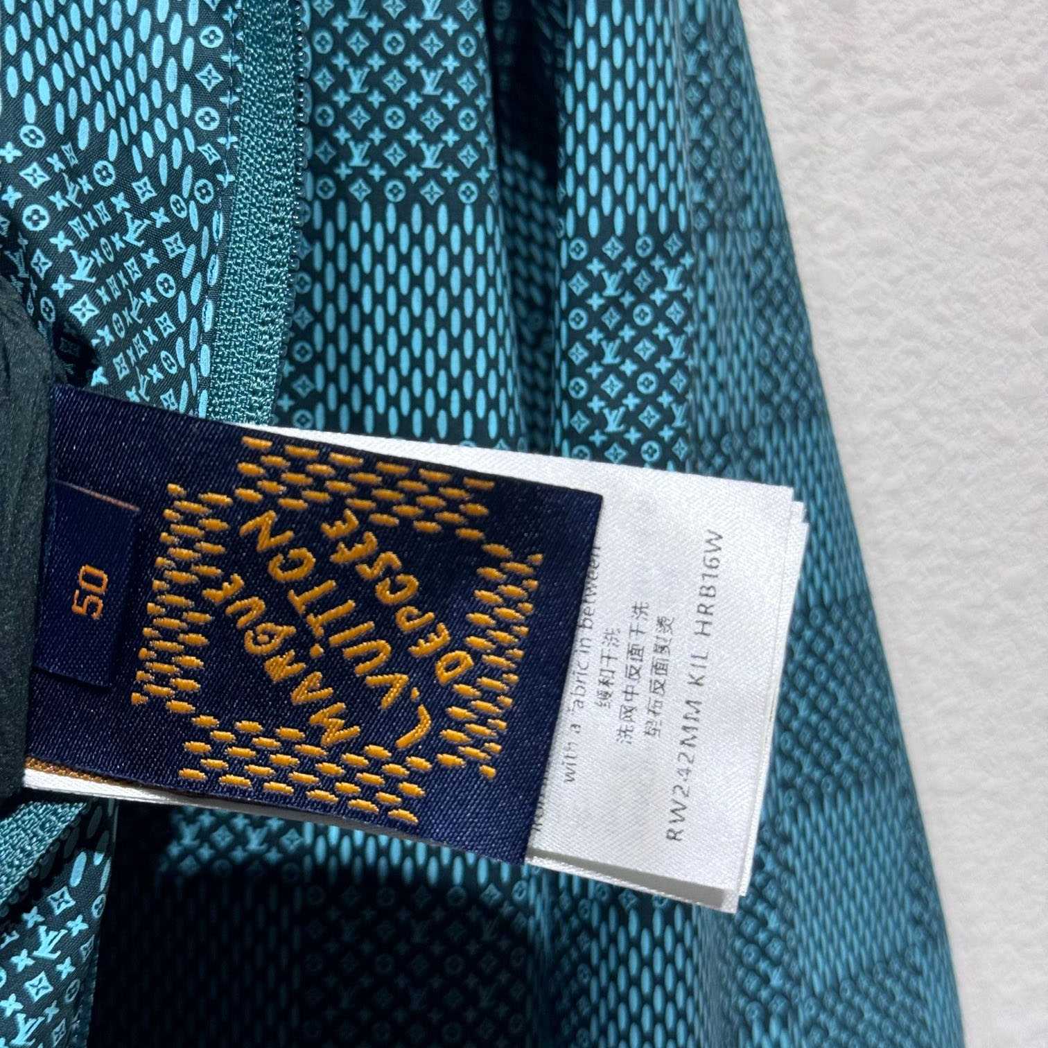 Louis Vuitton Printed Nylon Hooded Windbreaker   - DopestKickz