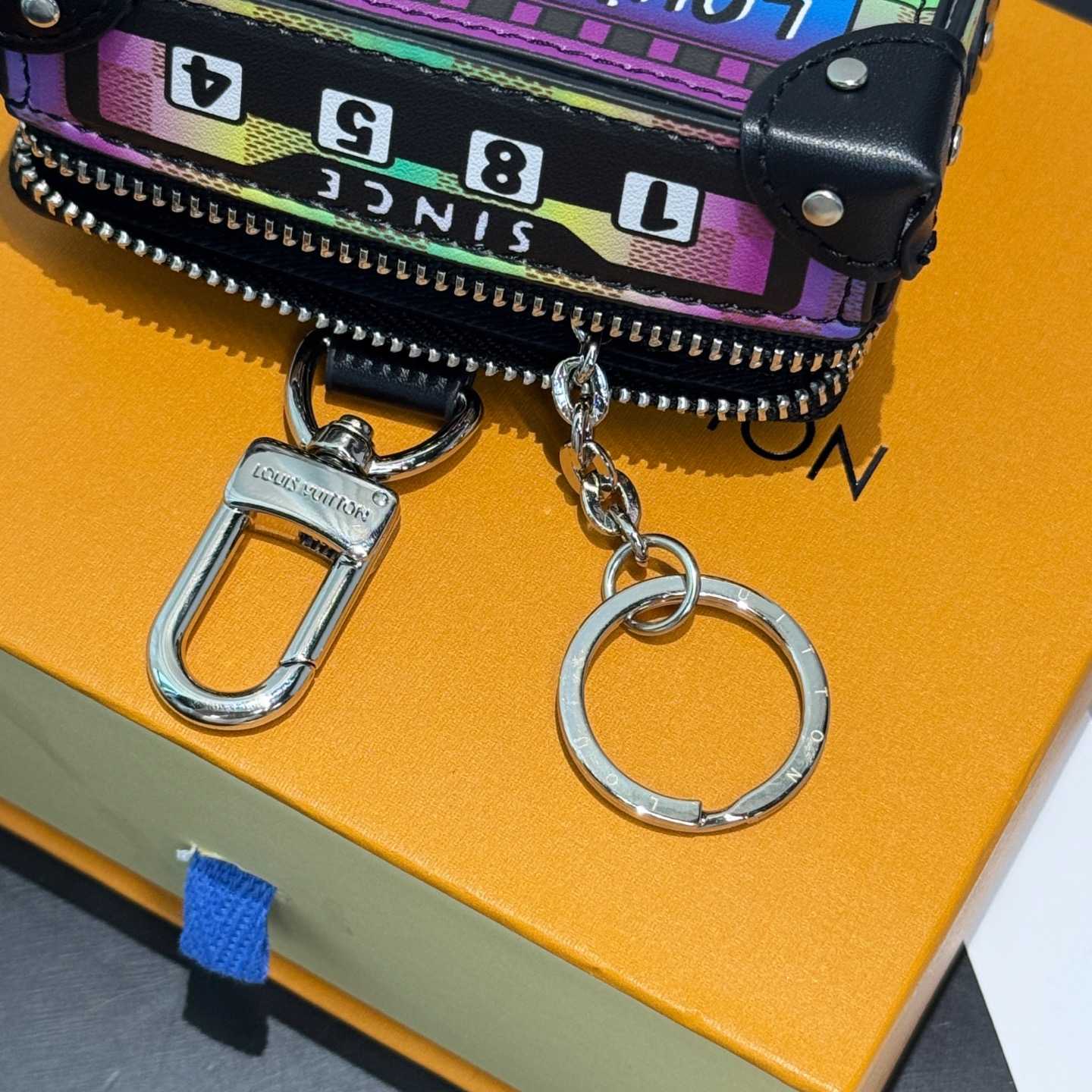 Louis Vuitton LV Stereo Bag Charm   M02395 - DopestKickz