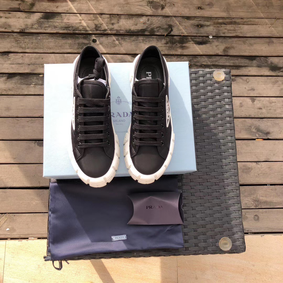 Prada Triangular Logo Plaque Sneakers - DopestKickz