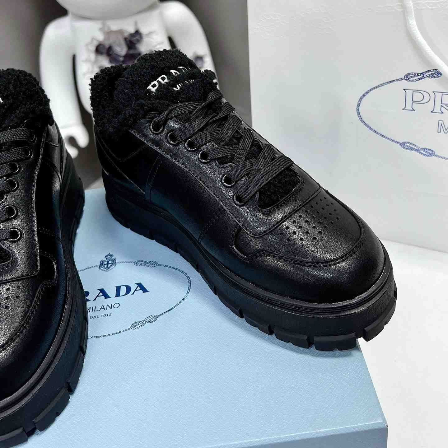 Prada Leather And Shearling Sneakers - DopestKickz