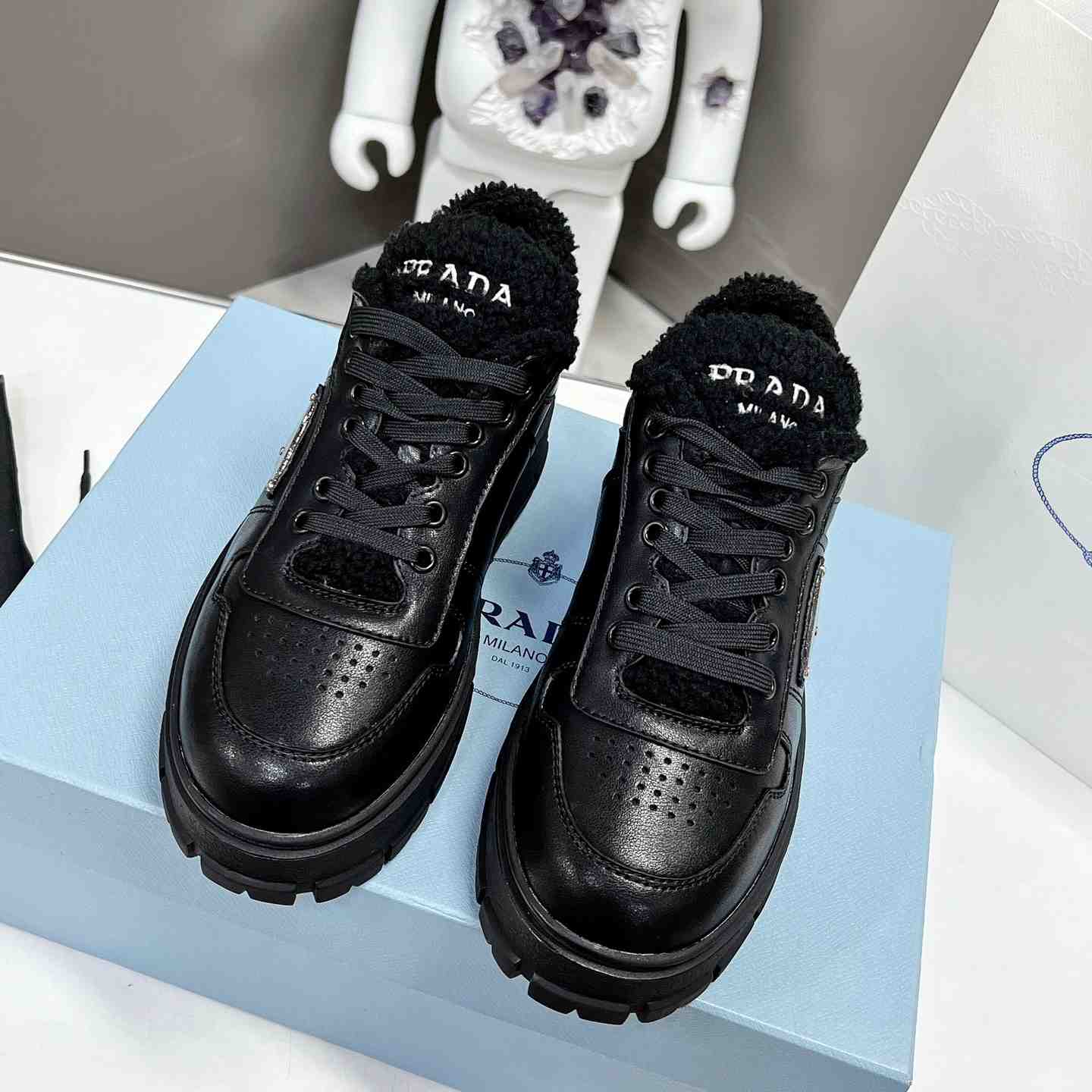 Prada Leather And Shearling Sneakers - DopestKickz