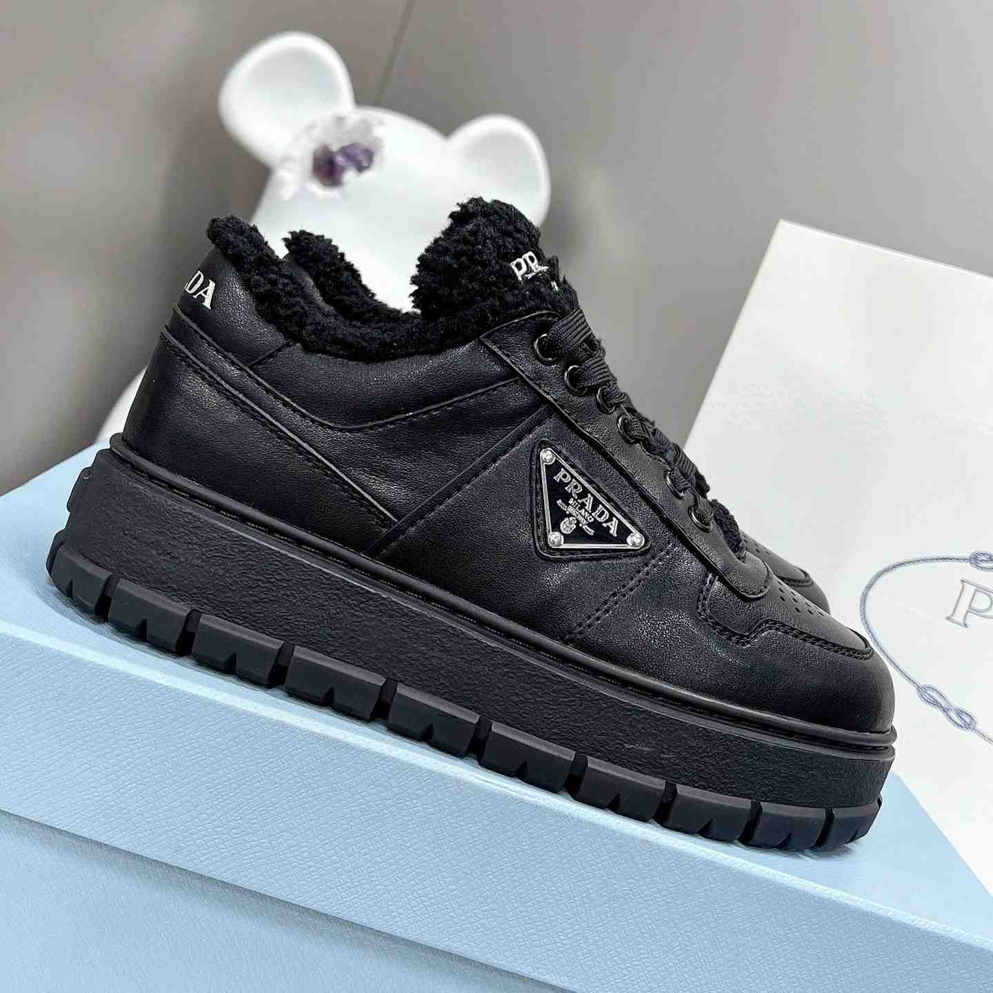 Prada Leather And Shearling Sneakers - DopestKickz