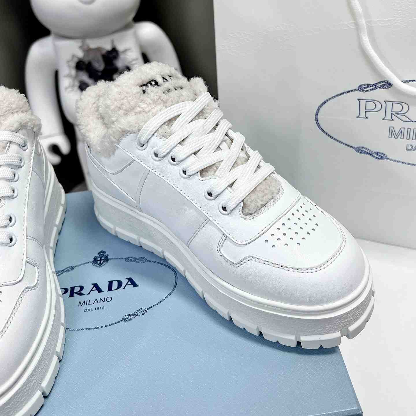 Prada Leather And Shearling Sneakers - DopestKickz