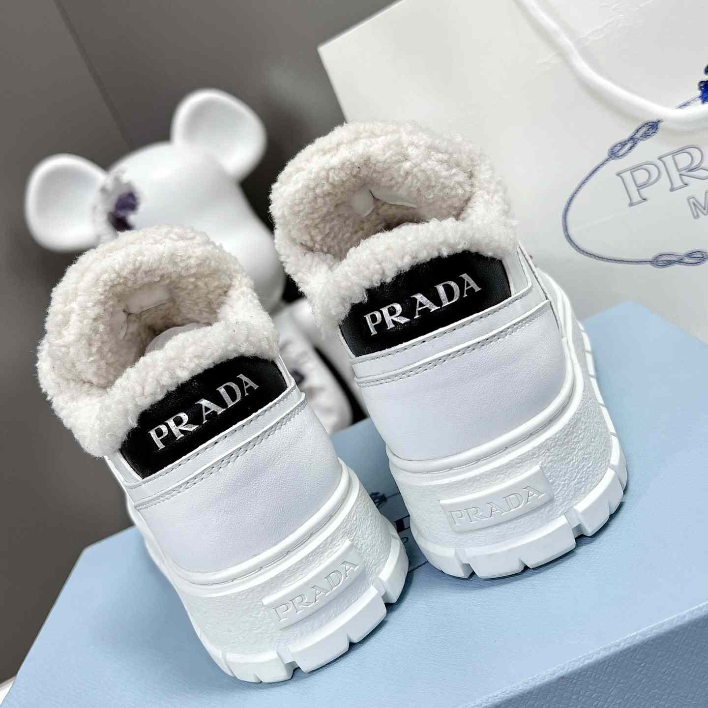Prada Leather And Shearling Sneakers - DopestKickz