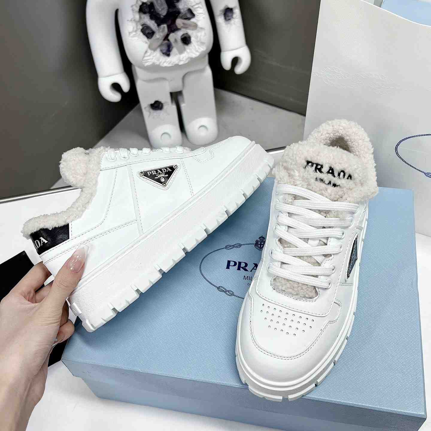 Prada Leather And Shearling Sneakers - DopestKickz