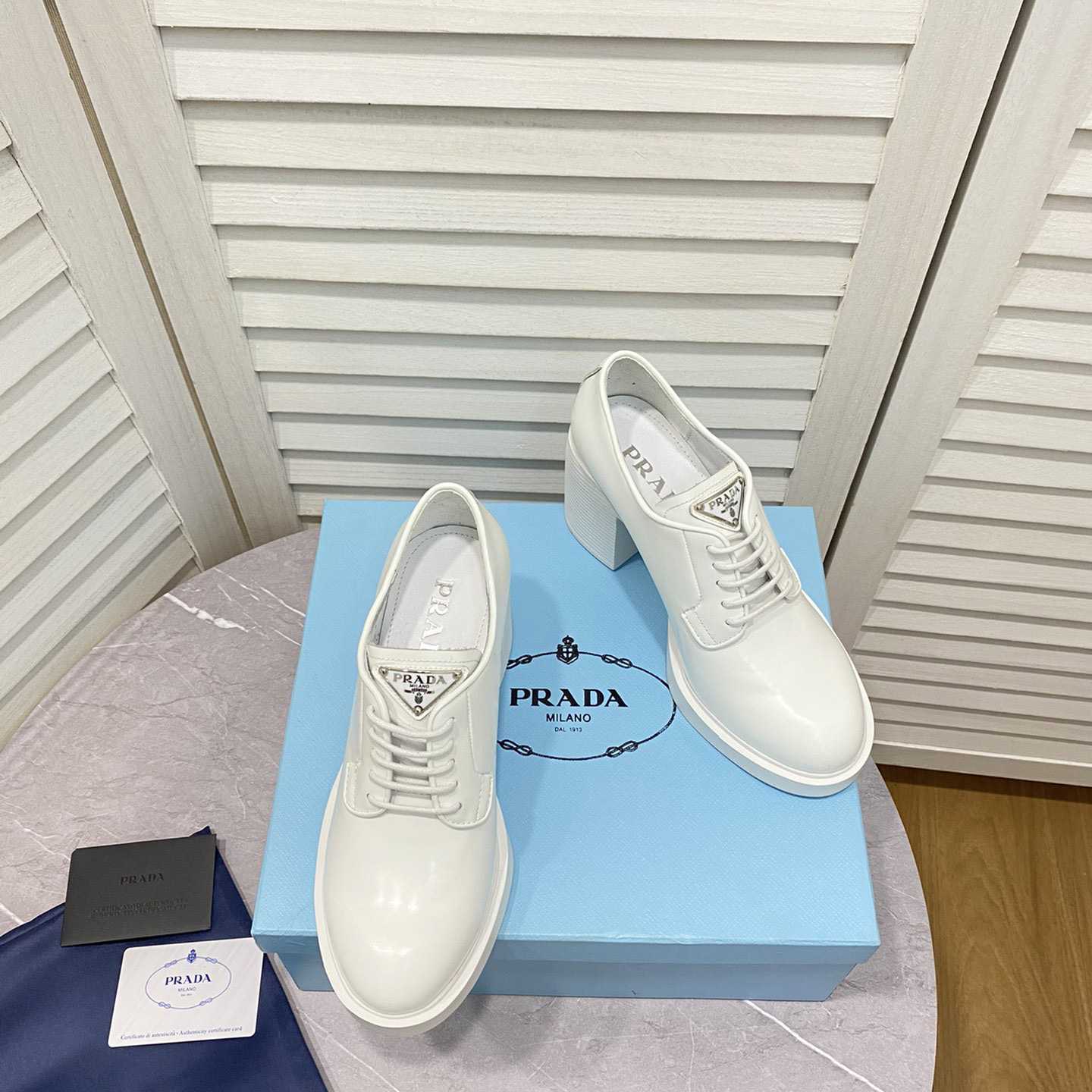 Prada Heeled Brushed Leather Lace-Ups - DopestKickz