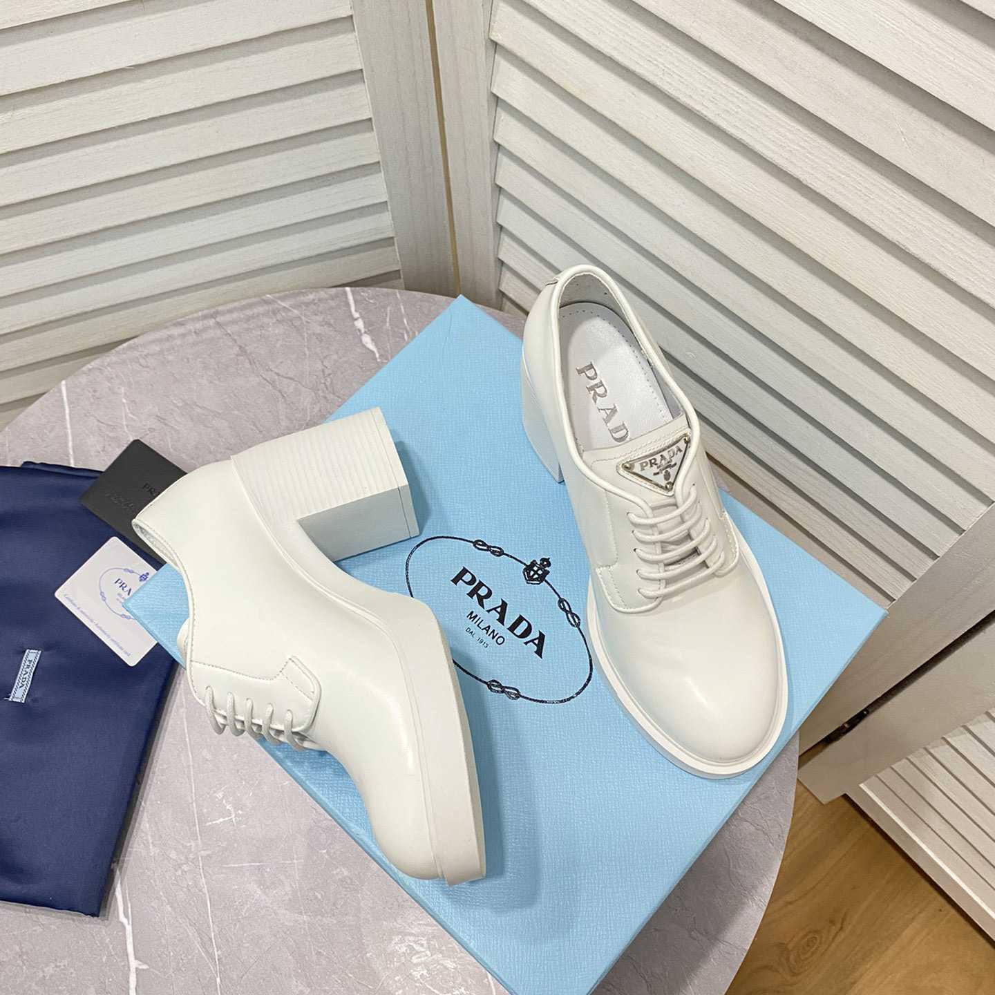Prada Heeled Brushed Leather Lace-Ups - DopestKickz