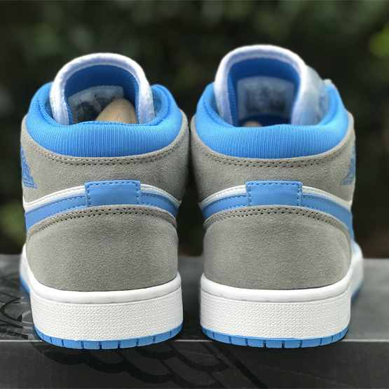 Air Jordan 1 Mid “University Blue” Sneaker    DX9276-100 - DopestKickz