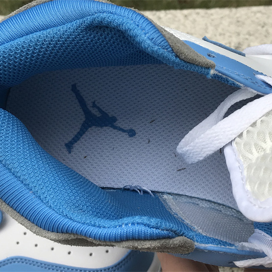Air Jordan 1 Mid “University Blue” Sneaker    DX9276-100 - DopestKickz