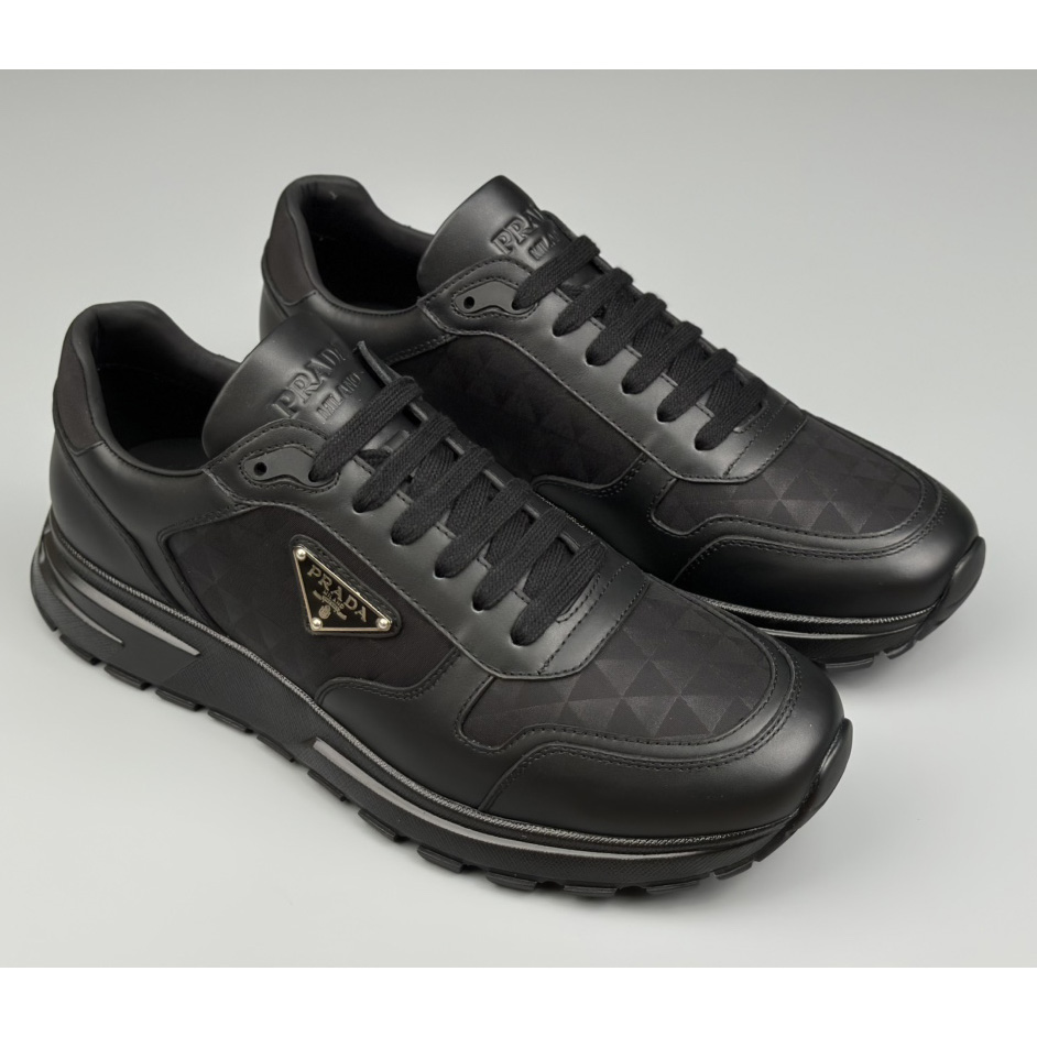 Prada Leather And Re-Nylon High-top Sneakers - DopestKickz