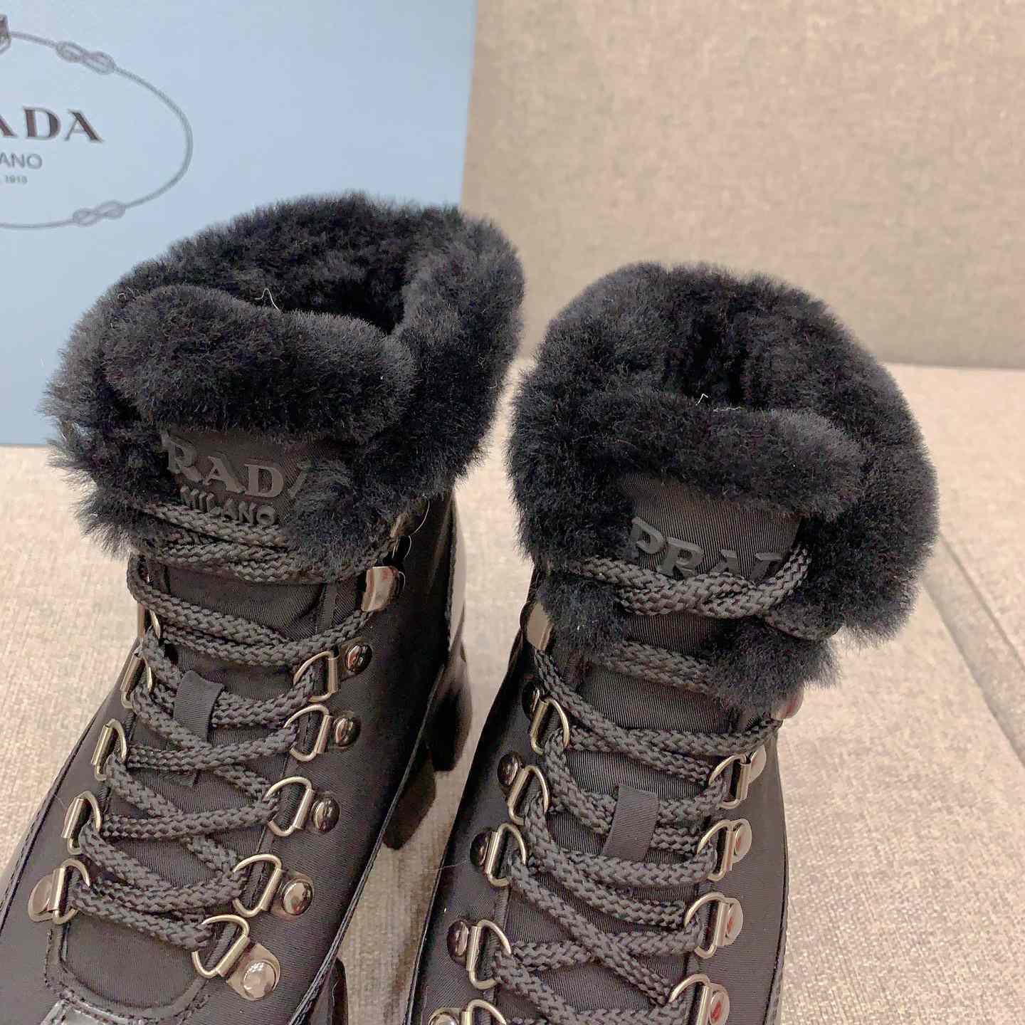 Prada Monolith Leather And Nylon Booties - DopestKickz