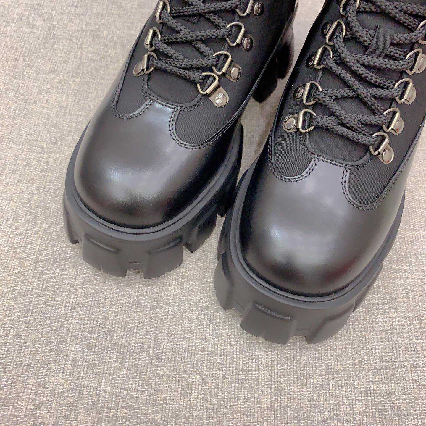 Prada Monolith Leather And Nylon Booties - DopestKickz