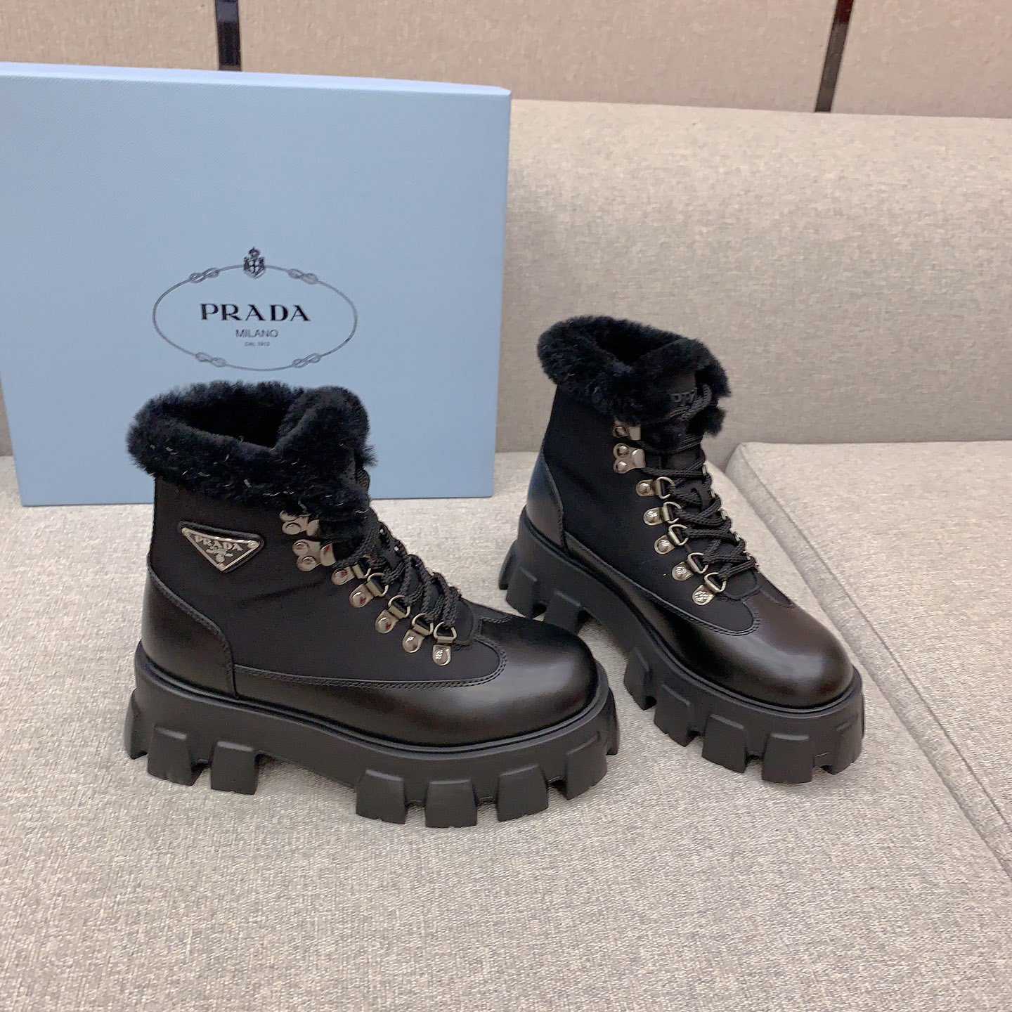 Prada Monolith Leather And Nylon Booties - DopestKickz