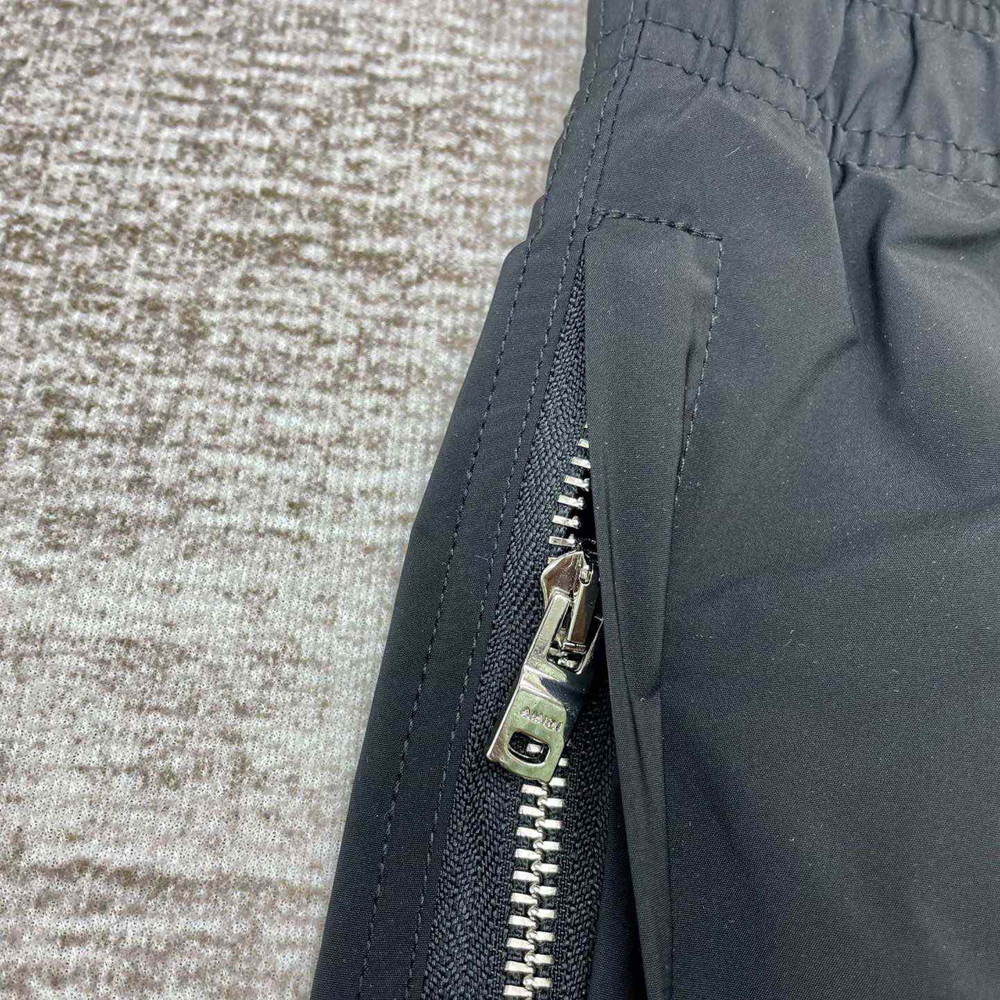 Amiri Staggered Swim Trunk - DopestKickz