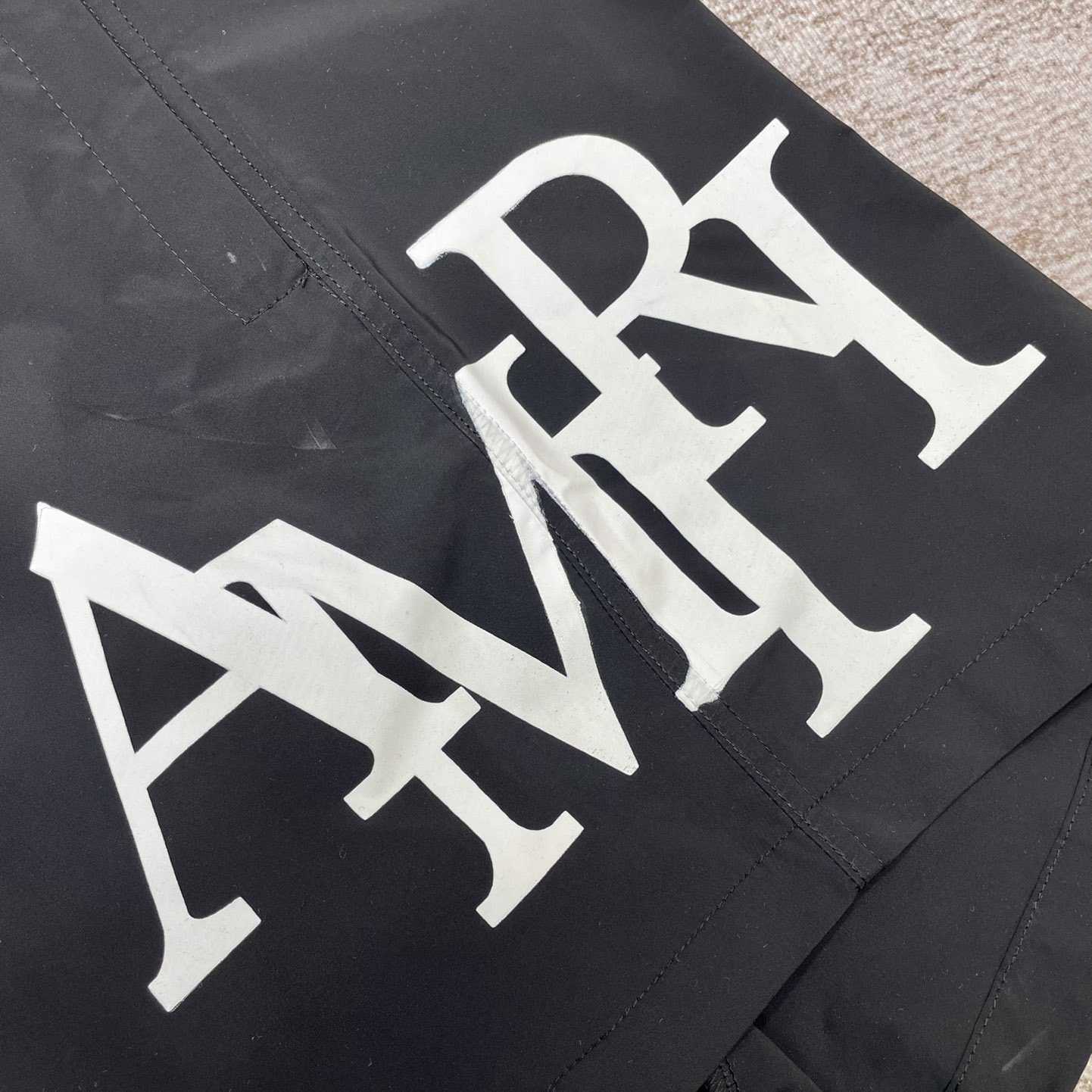 Amiri Staggered Swim Trunk - DopestKickz