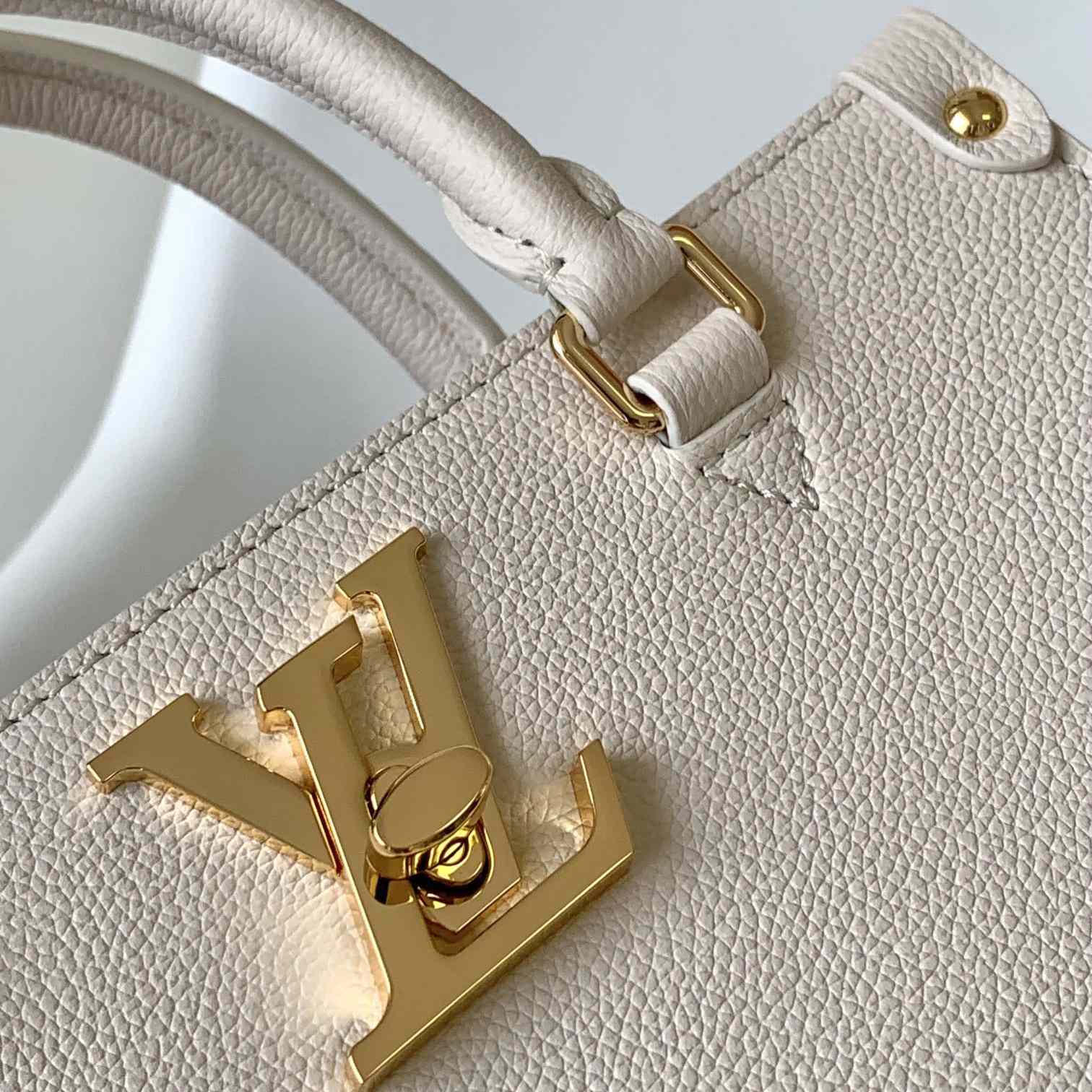 Louis Vuitton Lock & Go Handbag    M23637 - DopestKickz
